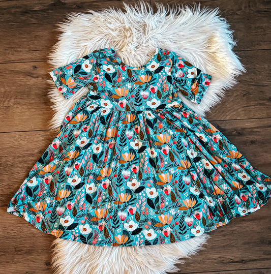Teal Floral Twirl Dress By Landrie Lou