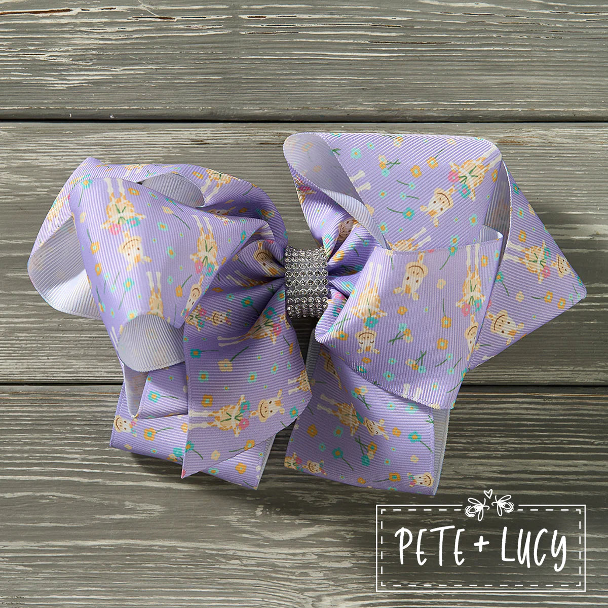 Gracie’s Giraffe Deluxe Bow by Pete + Lucy