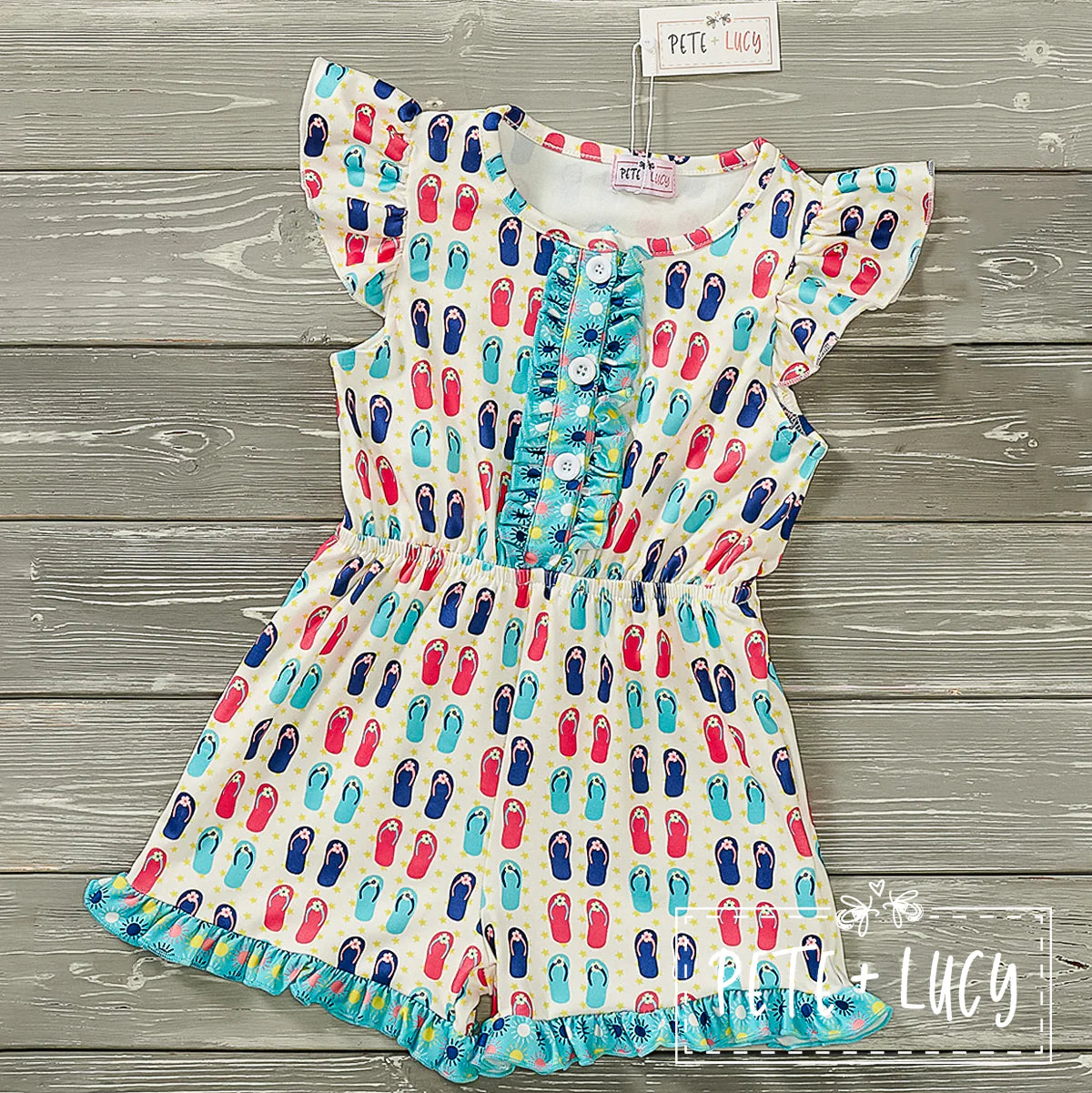 Flopping Into Summer Jumpsuit by Pete + Lucy